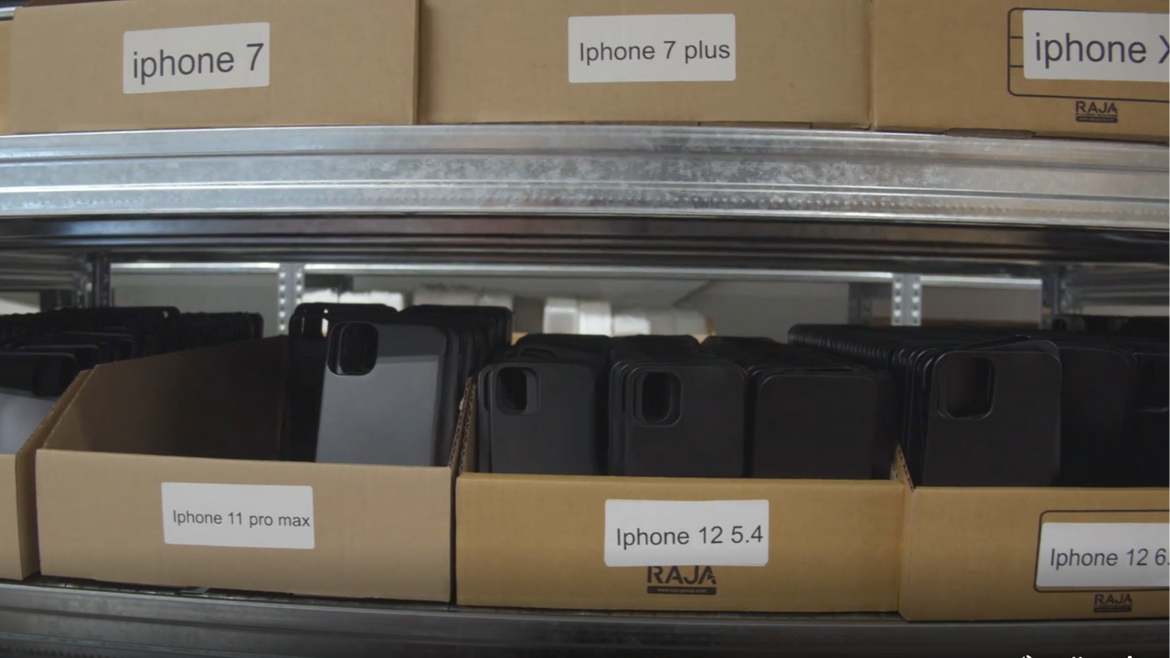 Blank phone cases ready to be printed in the old warehouse.